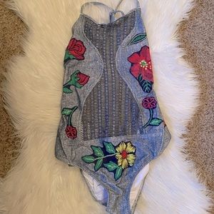 Despi monikini. Fits more like M/L. Never worn.